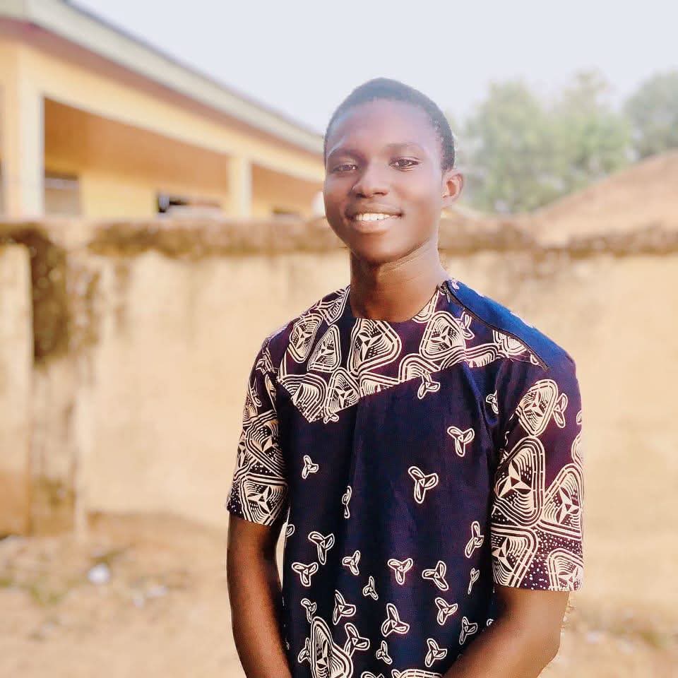 Zephaniah smiling outdoors